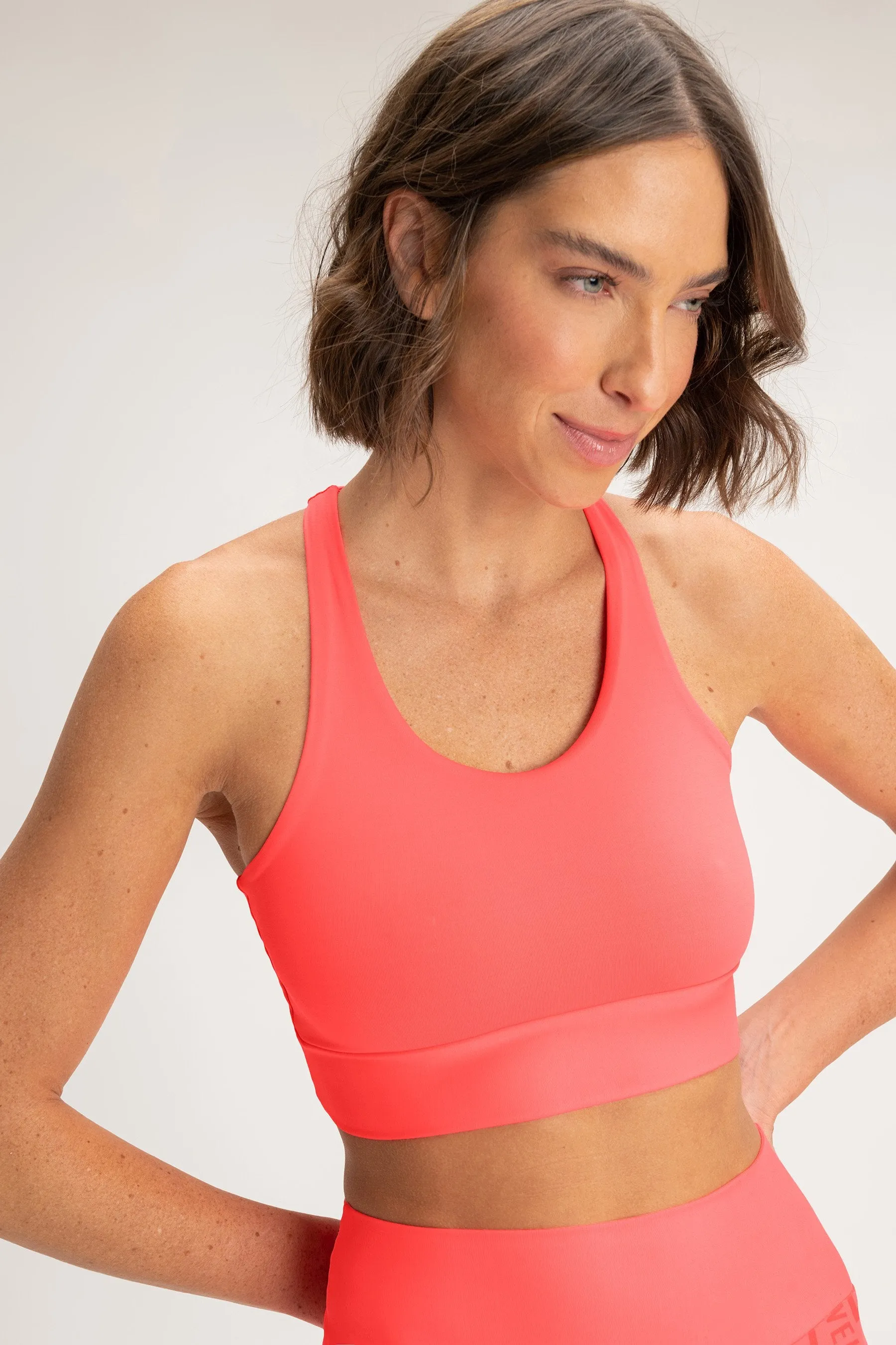 Essential Sense Mid Racer Sports Bra