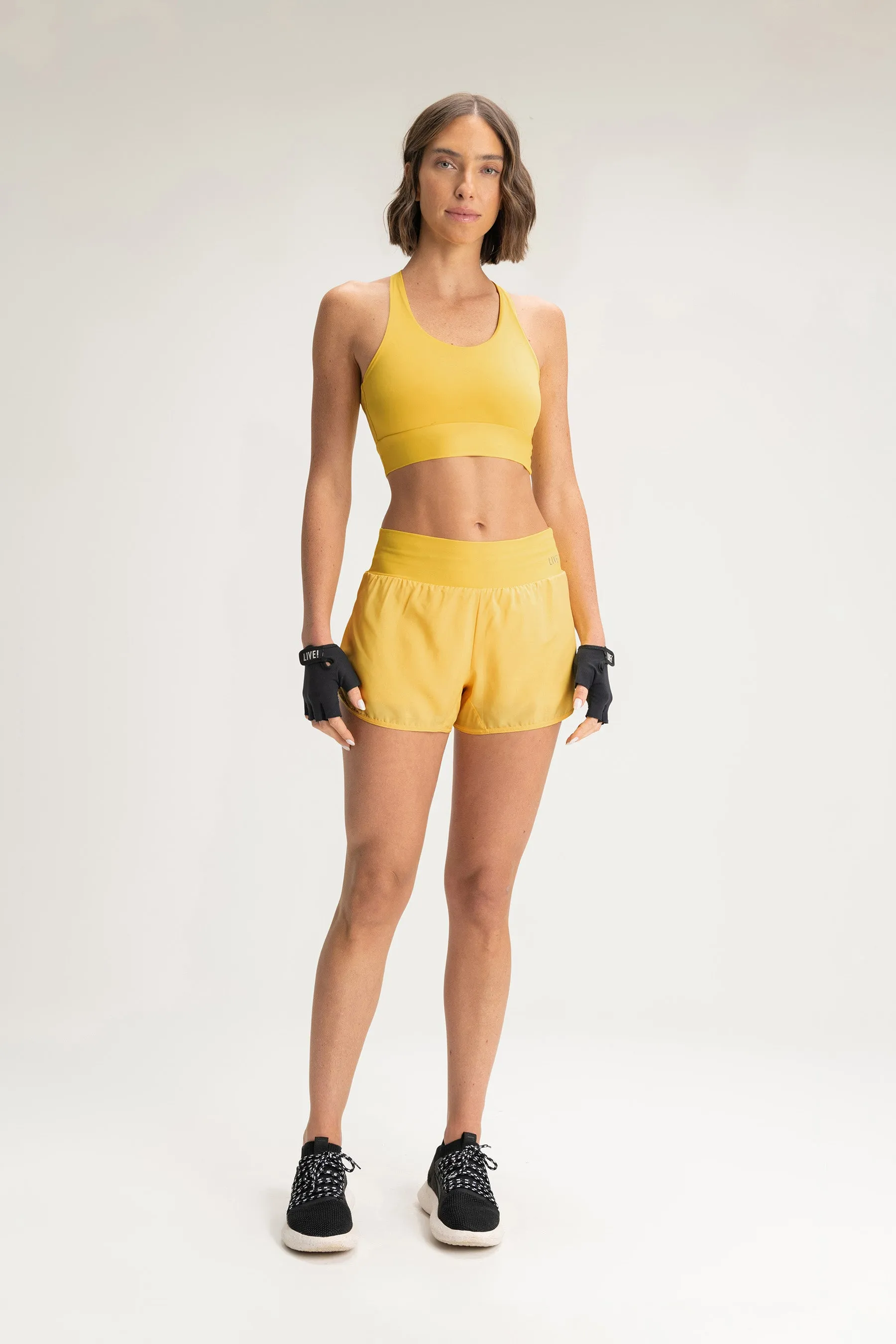 Essential Sense Mid Racer Sports Bra