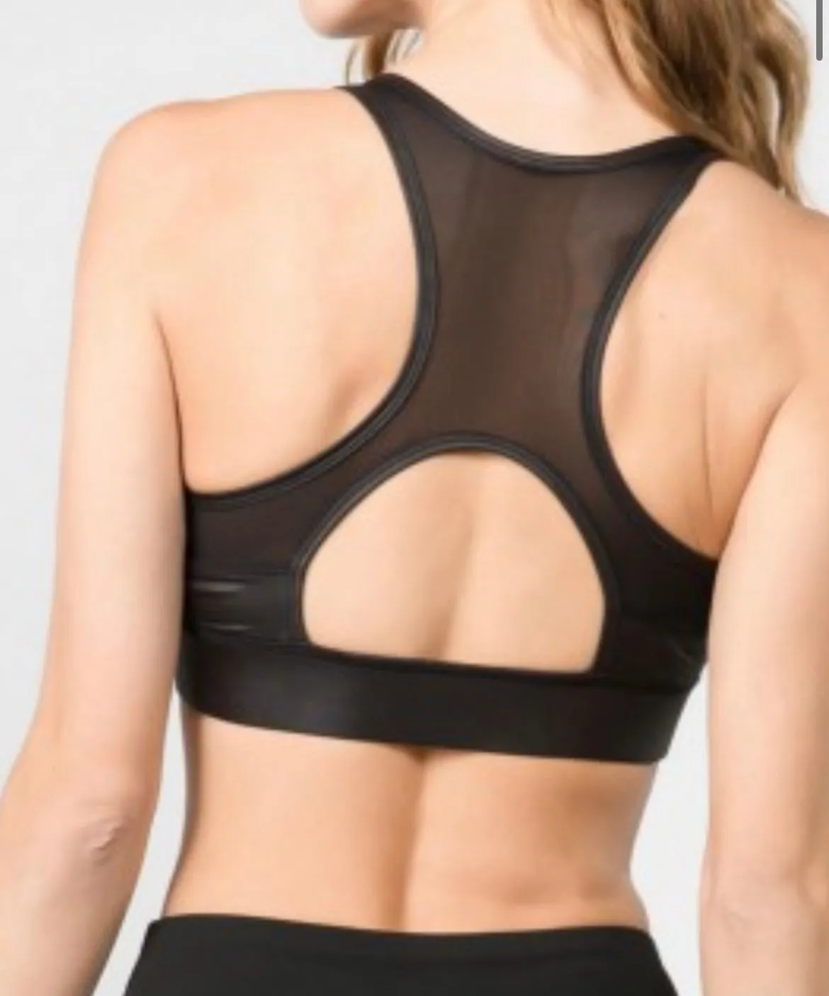 Sports Bra Featuring Stretchy Faux Leather With a Mesh Inset